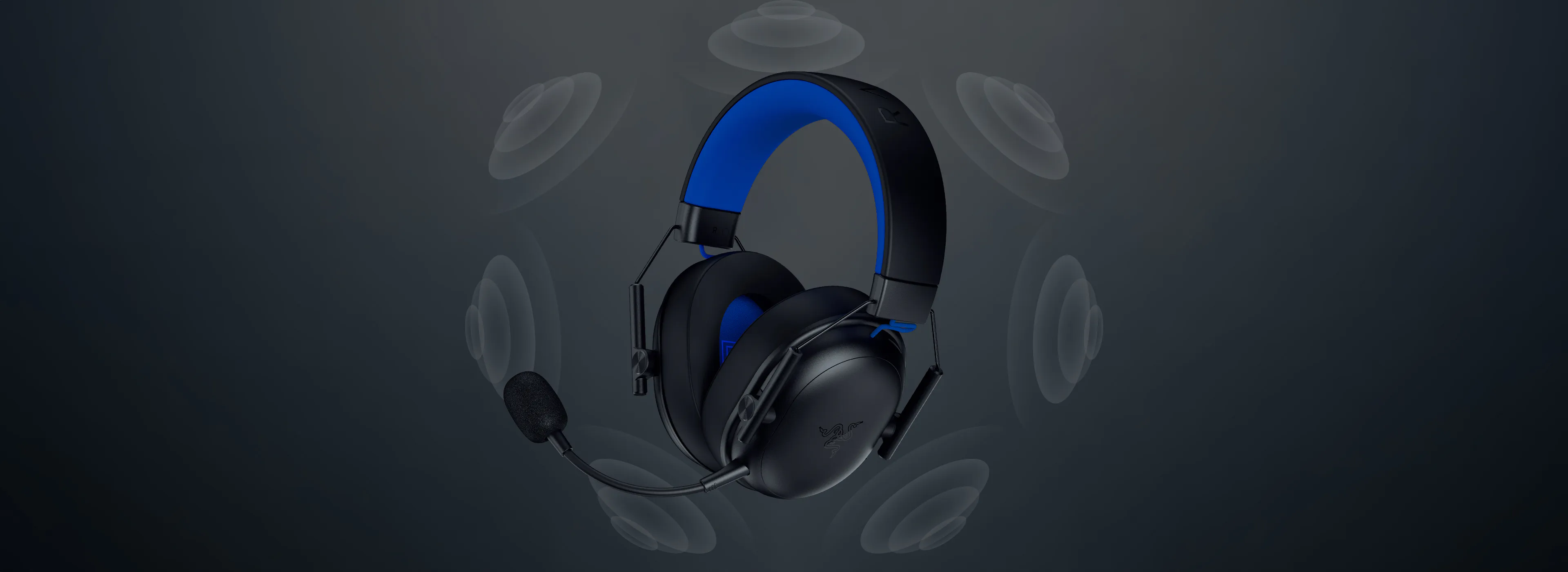 Wireless gaming headset with a built-in mic, black and blue ear cups, and sound wave icons indicating active sound.