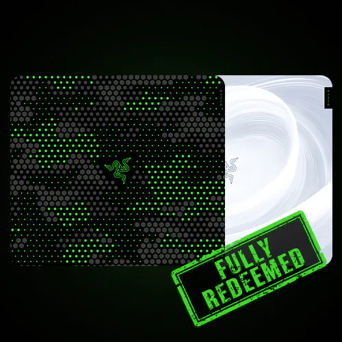 Razer prepaid card with a black and green dotted pattern, Razer logo, and a white card behind it labeled “FULLY REDEEMED” in green text.