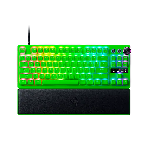 RGB backlit gaming keyboard with a wrist rest, volume dial, mappable keys, and a detachable cable on top.