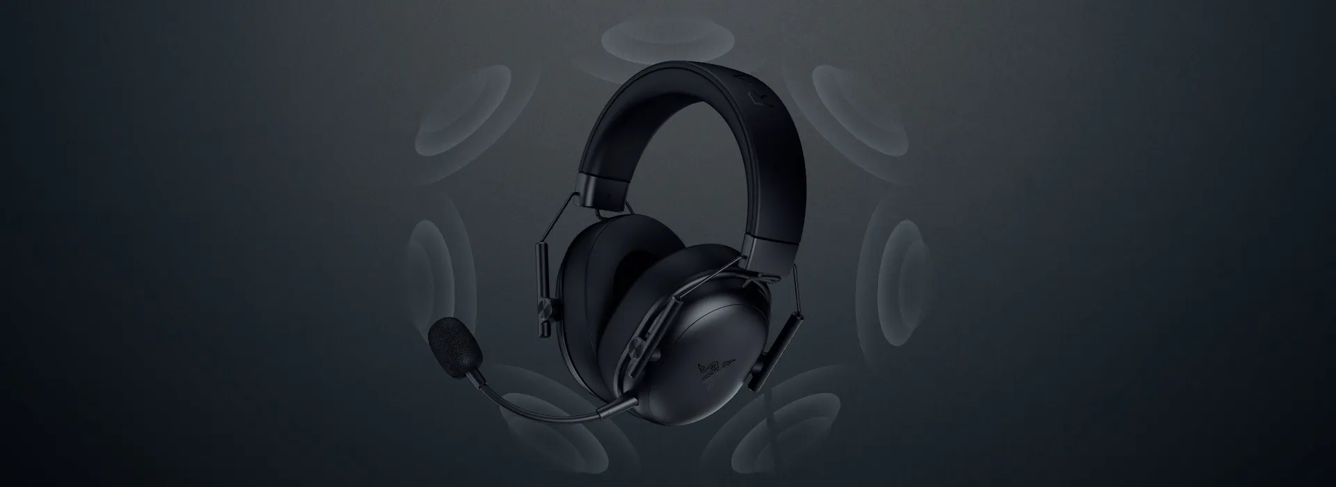 Black gaming headset with attached 麦克风, surrounded by sound wave icons on a dark background.