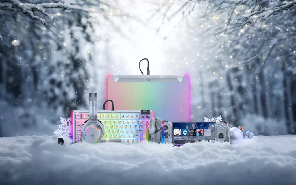 The full Razer Phantom White Collection arranged in a snowy winter landscape with soft sparkles.