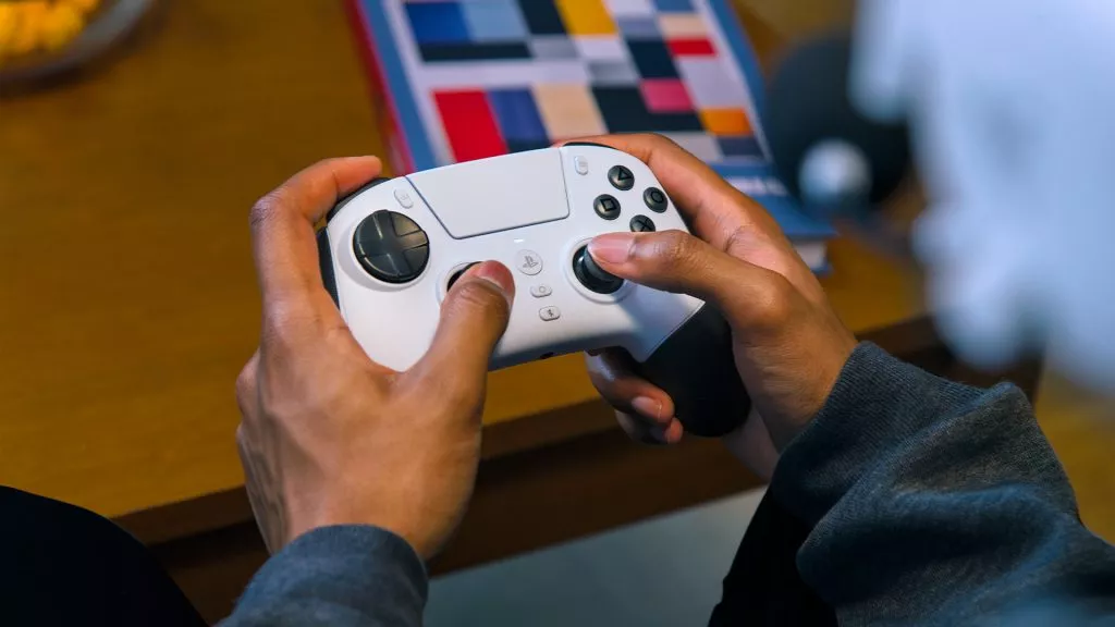 Razer Raiju V3 Pro controller being used for console gaming.