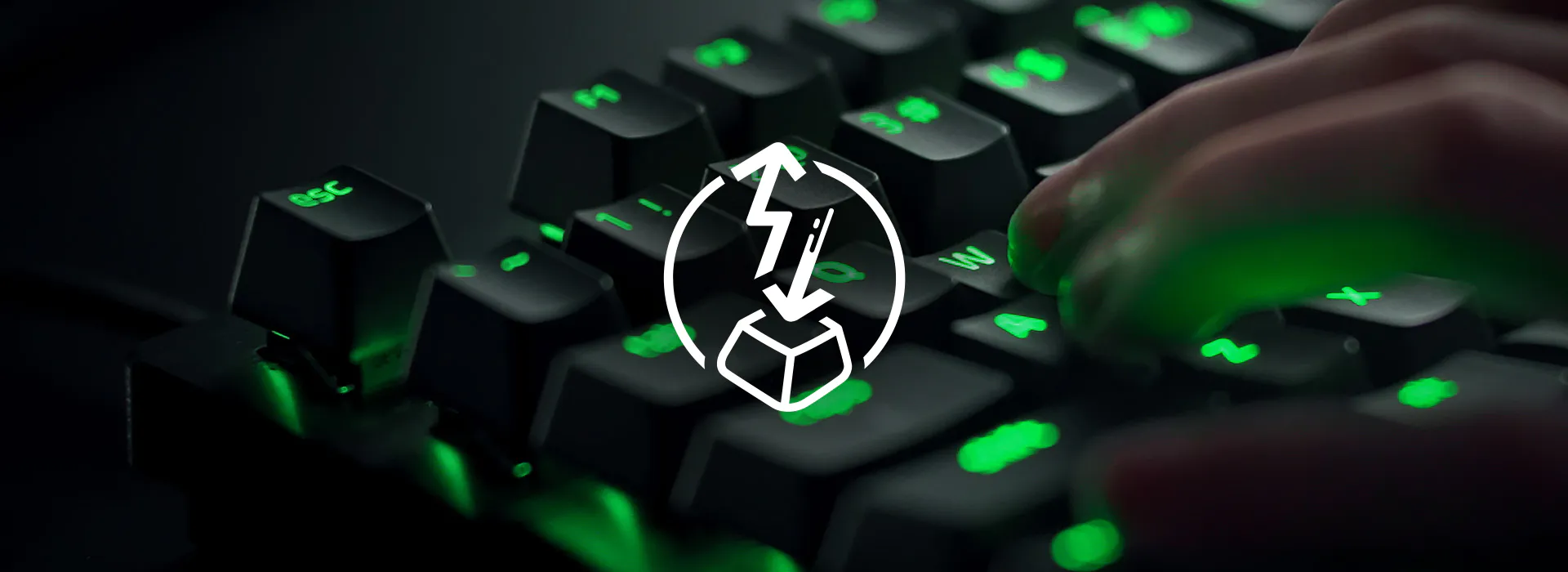 Keyboard with green backlight and a Rapid Trigger Icon overlay.