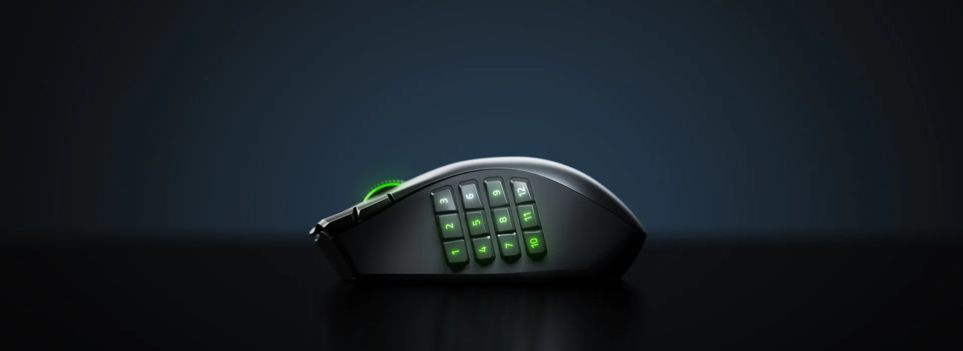 Black gaming mouse with 12 illuminated side buttons numbered 1–12 in green RGB lighting, photographed from the side against a dark background.