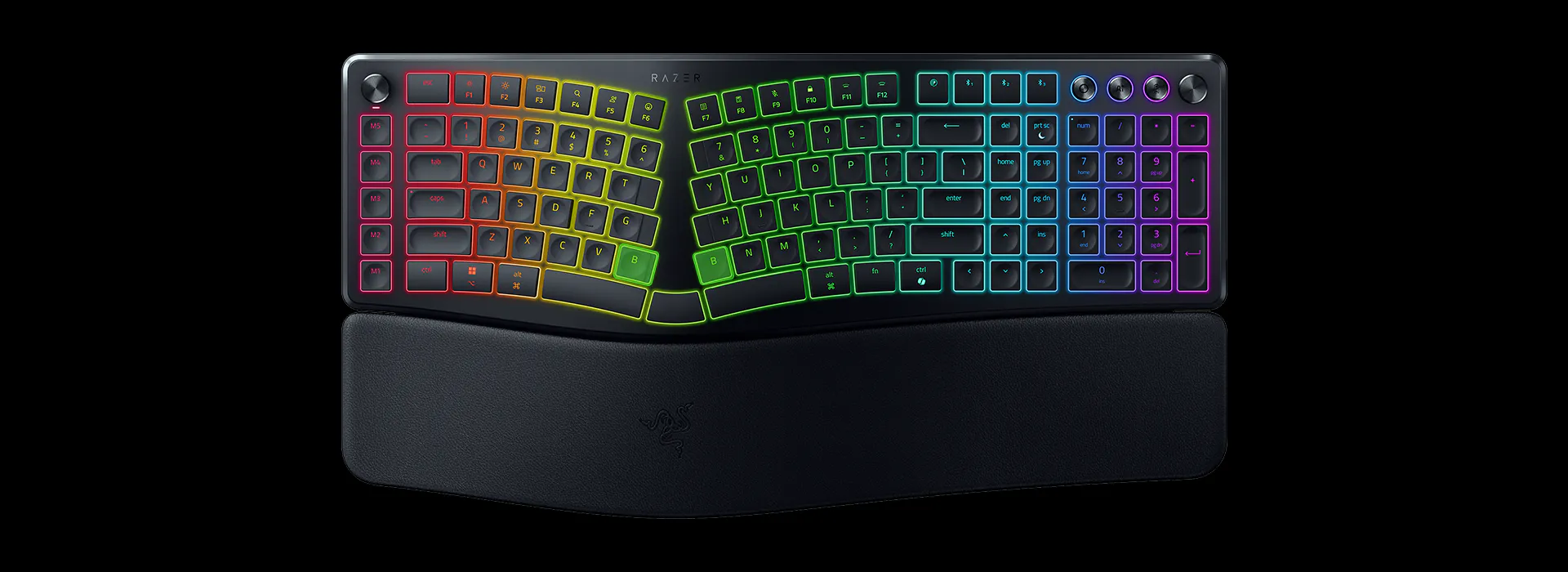 A black Razer RGB gaming keyboard featuring multicolor backlit keys, a numeric keypad, arrow keys, function keys, and a detachable wrist rest.