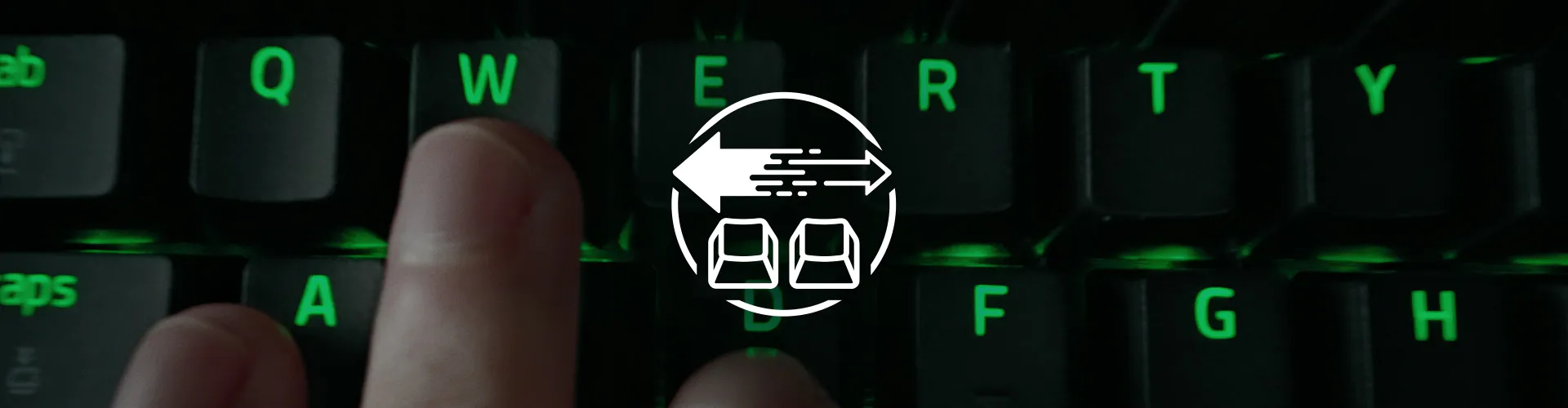 Keyboard with green backlight and a Razer Snap Tap Icon overlay.