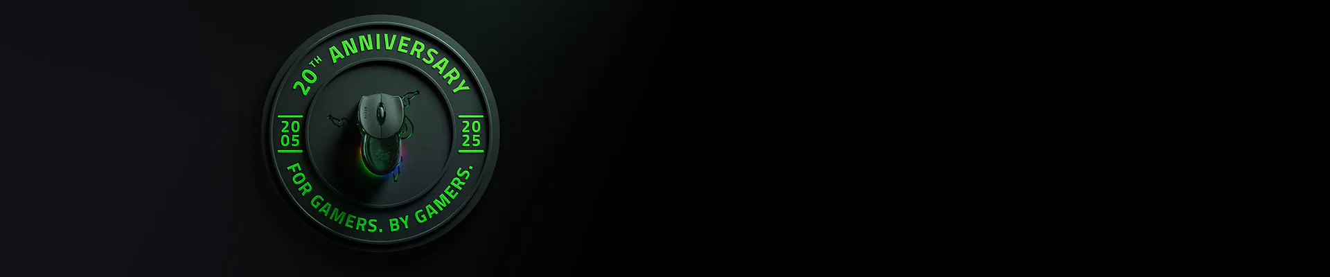 A black circular 20th anniversary badge with a gaming mouse in the center, green text: "20th ANNIVERSARY FOR GAMERS. BY GAMERS! 05/25".