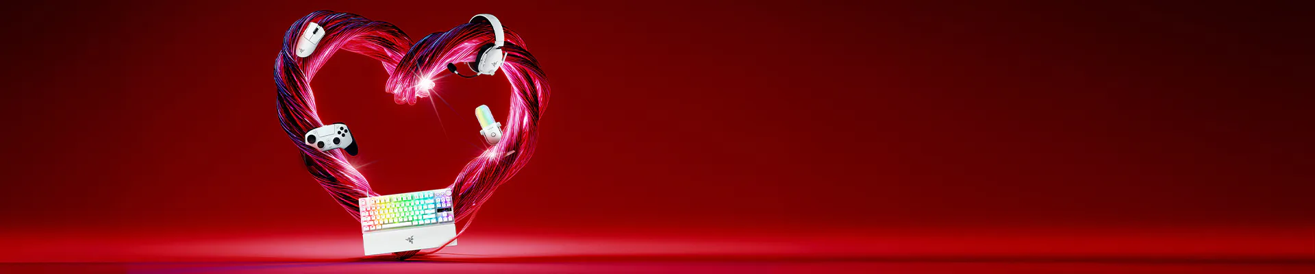 A heart-shaped outline of colorful gaming accessories, including a keyboard, controller, headphones, headset, and a glow stick, on a red background.