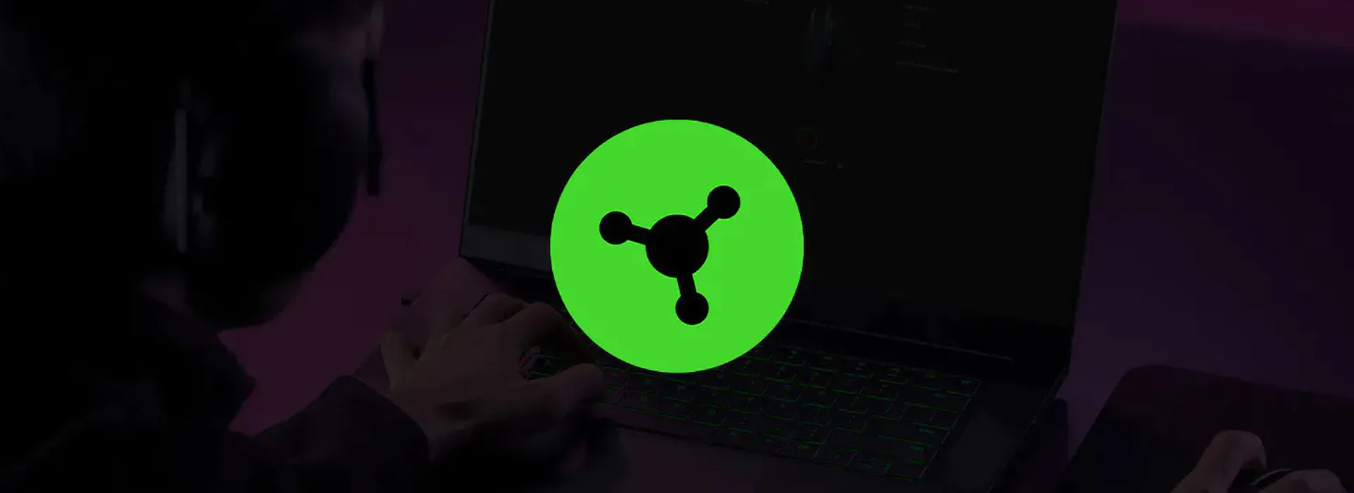 Person using laptop with a Synapse logo overlay.