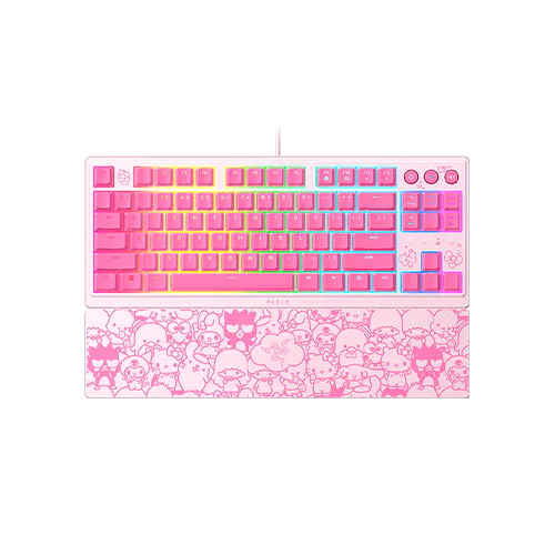 Pink keyboard with colorful pastel keys, surrounded by cute cartoon character illustrations on the palm rest. No visible text on keys.