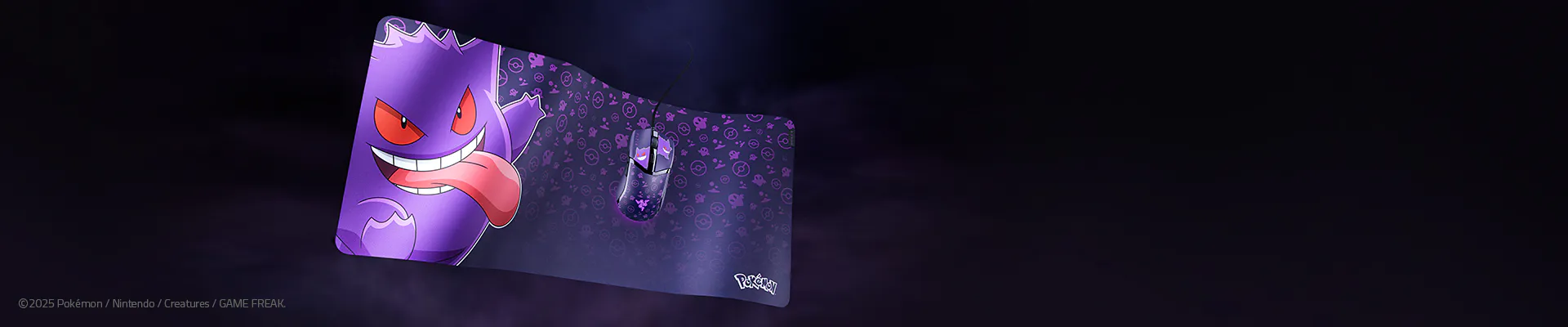 A Pokémon-themed mouse pad and mouse set featuring Gengar with its tongue out, purple background with Pokémon patterns, and a small Pokémon logo.