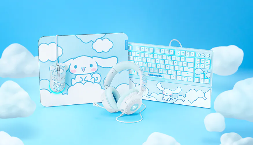 A pastel blue themed Bunny Café-themed set with a Bunny Café folder, Joy-Con, a white keyboard, and headphones; decorated with clouds.
