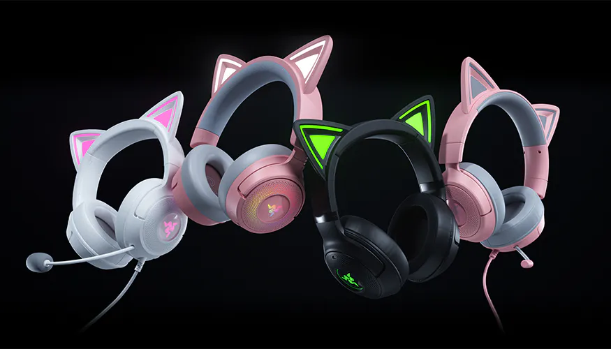 Collection of colorful gaming headsets with cat ear designs in pink, white, and black, some with glowing lights and microphones.