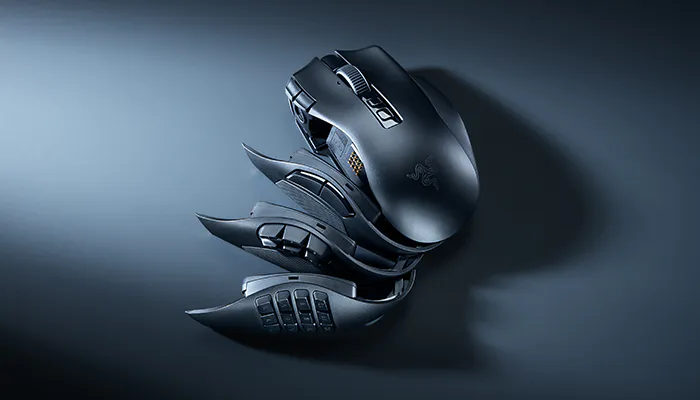 A modular, black gaming mouse with adjustable parts, buttons, and textured grips, designed for customizable ergonomics and precision.
