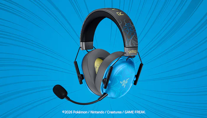 Blue Pokémon-themed gaming headset with black accents, microphones, and "R" and "L" labels on the headband, against a blue burst background.