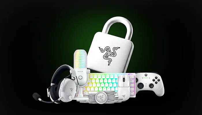 A collection of gaming and tech accessories including a headset, RGB keyboard, mouse, controller, Razer logo lock, and a rainbow-colored capsule.