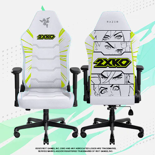 Office chairs with cartoon anime face designs, one plain with "2XKO" logo, the other with anime panels and the "2XKO" logo.; @2025 RIOT GAMES, INC. 2XKO AND ANY ASSOCIATED LOGOS ARE TRADEMARKS, SERVICE MARKS, AND/OR REGISTERED TRADEMARKS OF RIOT GAMES, INC.