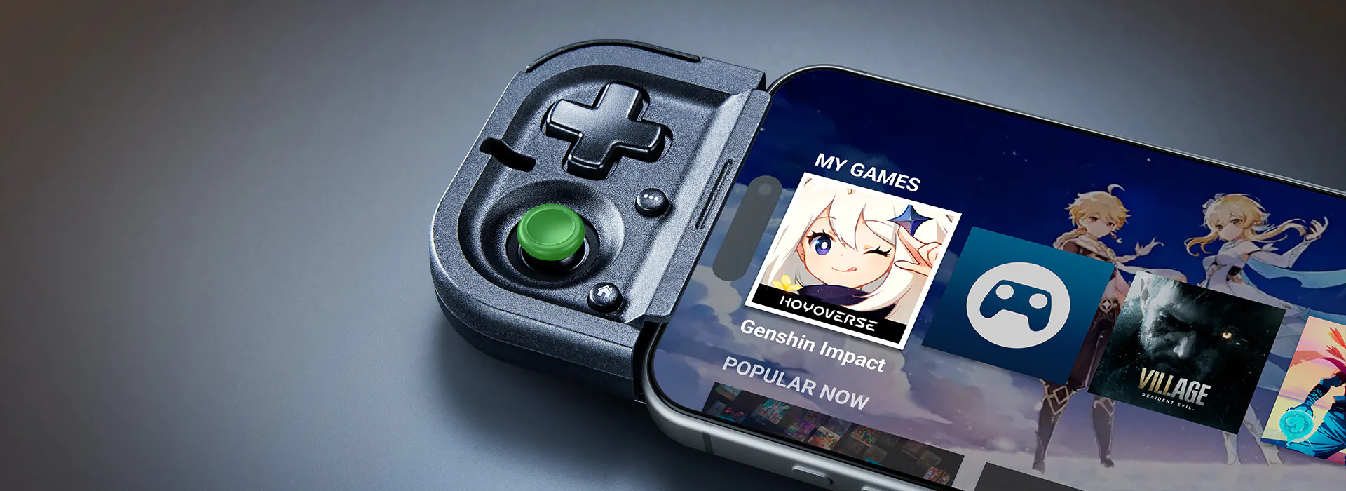 Smartphone with a gaming app open, showing games, placed on a gaming controller with green glowing thumbstick.