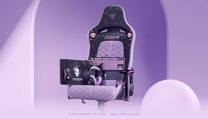 Gaming chair with purple accents, plush seat, purple keyboard, mouse, headset, and Kuromi-themed accessories on a white surface.