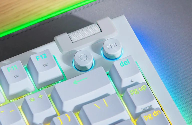 Multi-function roller and dedicated media buttons on the white Razer BlackWidow V4 75 percent keyboard