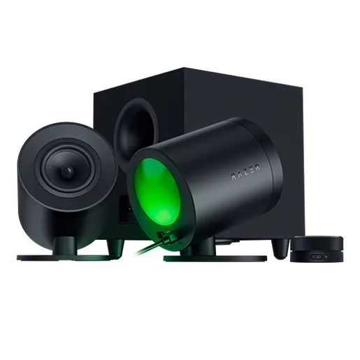 Black Razer speaker set with a cylindrical subwoofer, two satellite speakers, and a black box, all with green lighting accents.