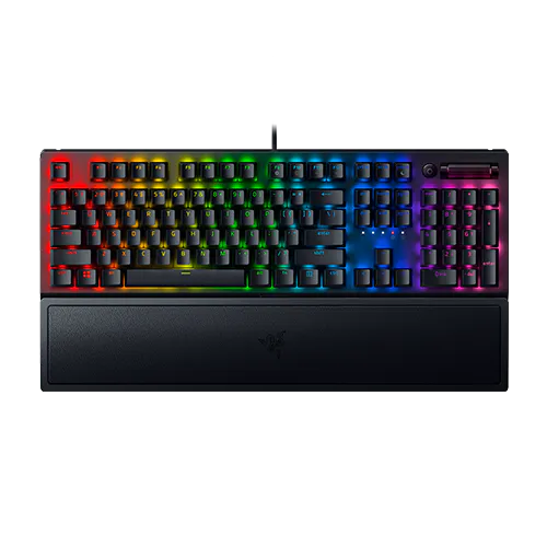 RGB backlit mechanical keyboard with a wrist rest, featuring multicolor key illumination and a numeric keypad on the right.