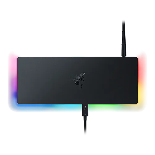 Razer gaming mouse pad with RGB lighting, featuring a black surface, with a logo in the center, and RGB glow around edges.