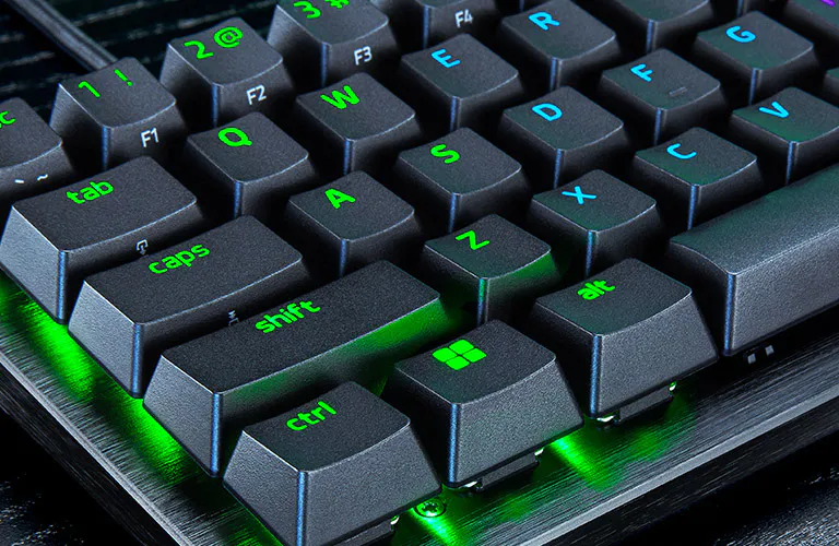 Close-up of textured doubleshot PBT keycaps on the black Razer Huntsman V3 Pro Mini