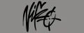 A black signature-style scribble on a gray background with some stylized, illegible text or design.