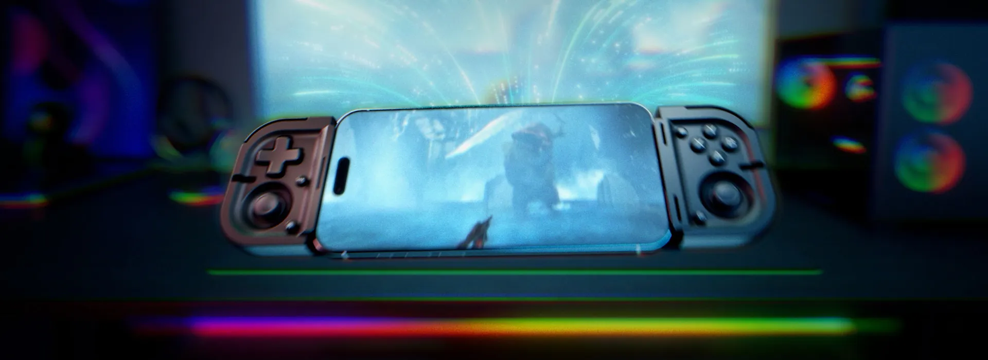 A gaming phone with attached controllers displays a sci-fi game, with colorful LED lighting on a desk and speakers in the background.
