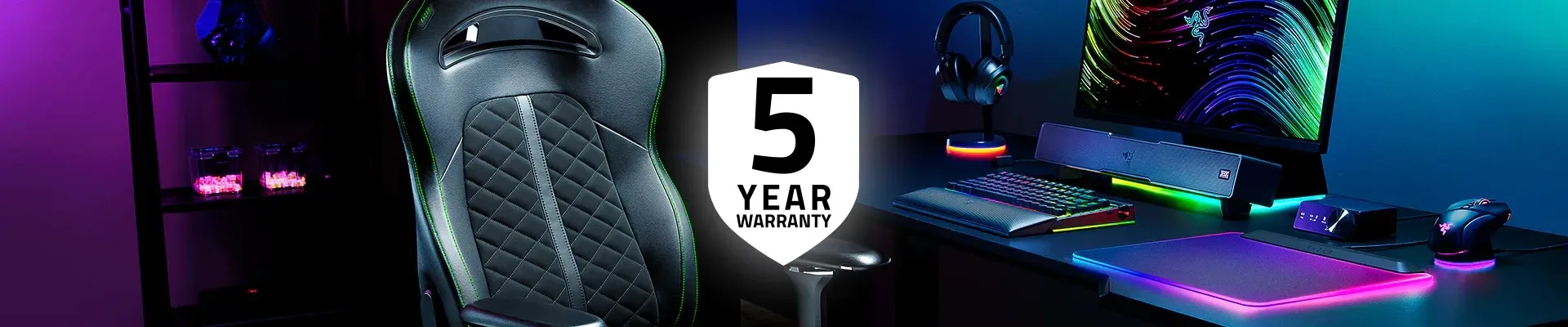 Gaming setup with RGB lighting, a monitor, keyboard, mouse, a headset, and a 5-year warranty badge in the center.