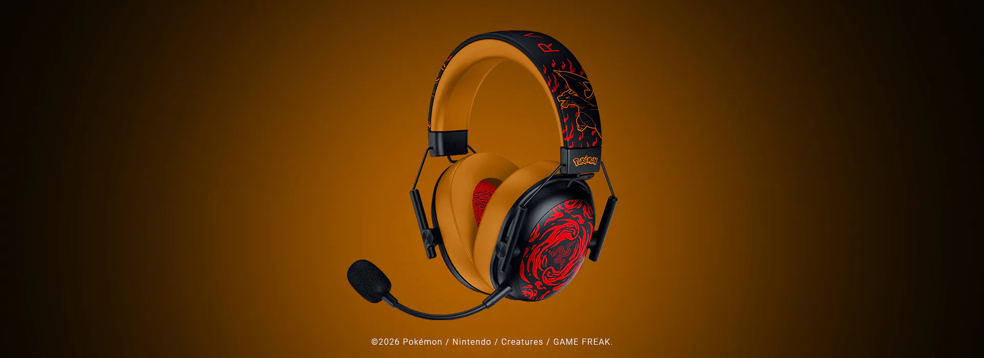 3/4 view of Razer BlackShark V3 X HyperSpeed - Charizard Edition. ©2026 Pokémon / Nintendo / Creatures / GAME FREAK.