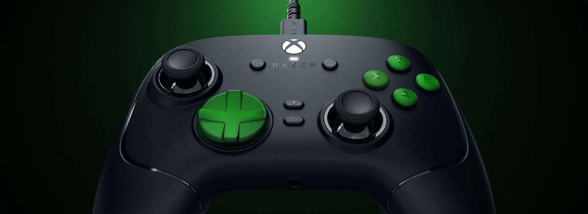 Top view of game controller with green marked at D-pad, and action buttons.